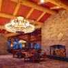 large stone fireplace in lodge